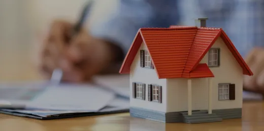 Dream home model with paperwork